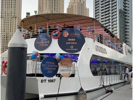 Corporate yacht event branding and annual recognition ceremony setup in Dubai Marina
